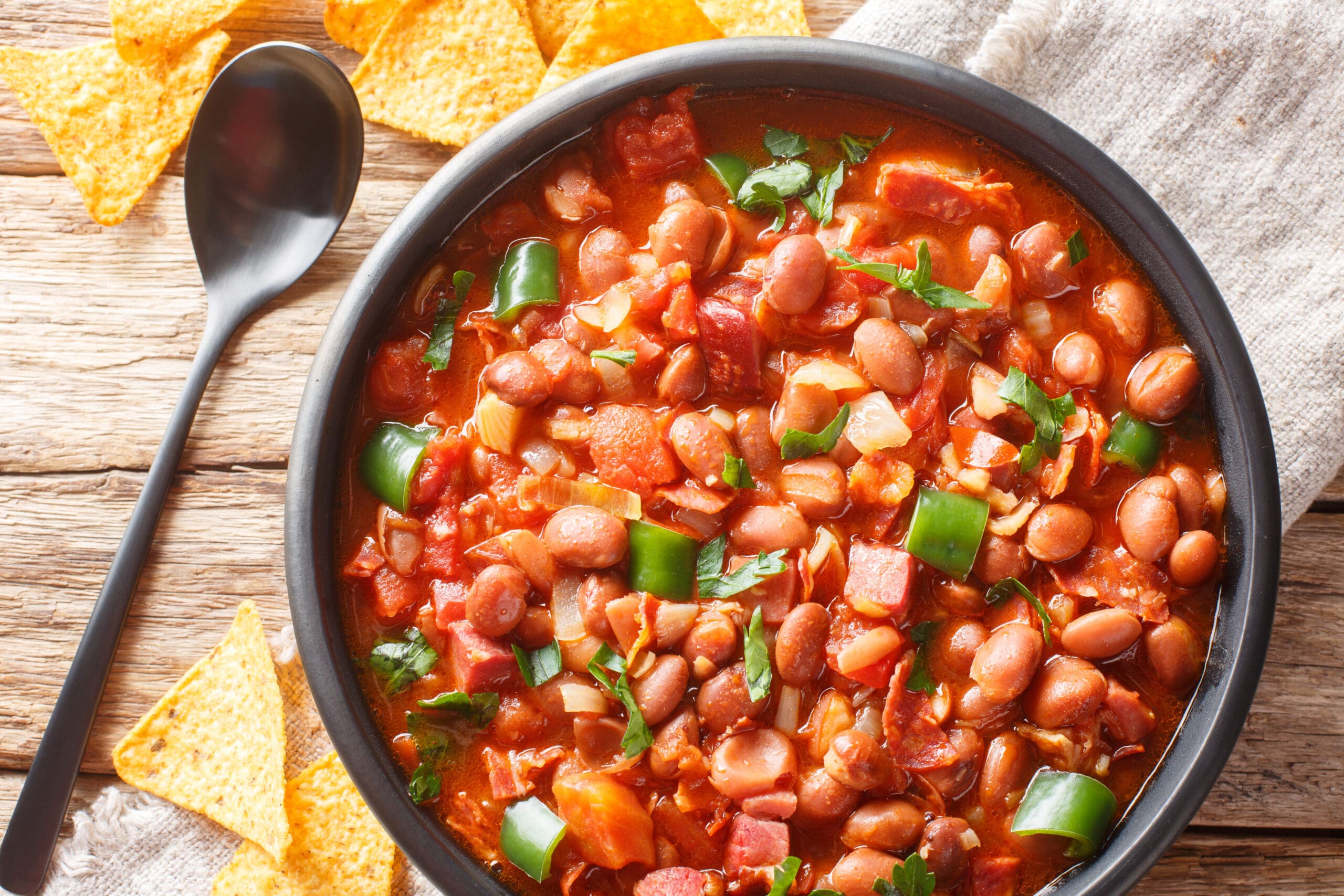 Spicy Pinto Beans With Sausage And Green Peppers - The Butcher Shop, Inc.